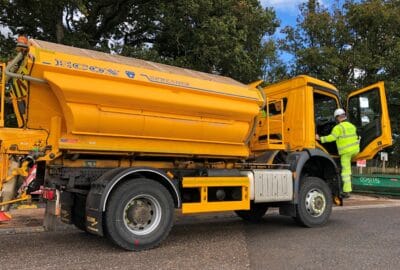 Gritter driver getting into a gritting lorry