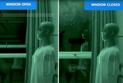 screen grab from the government's video - two dummies: one in a smoky room with the window shut; the other in a clearer room with the window open