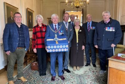 Chairman and guests with Christmas hamper