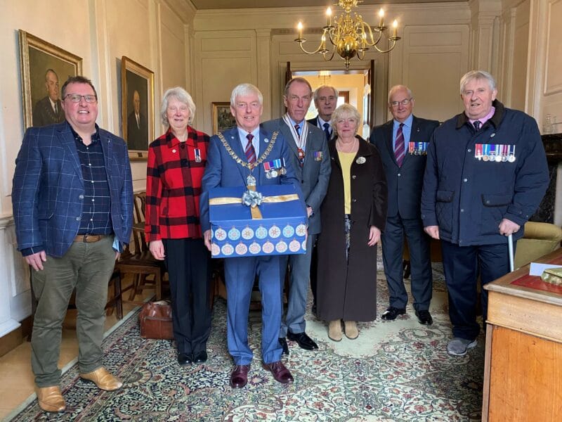 Chairman and guests with Christmas hamper