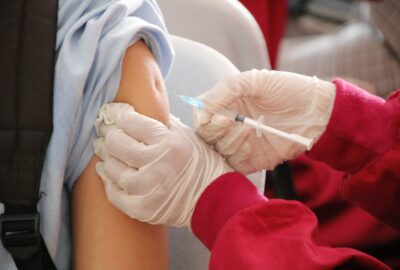 Young person receiving their vaccination