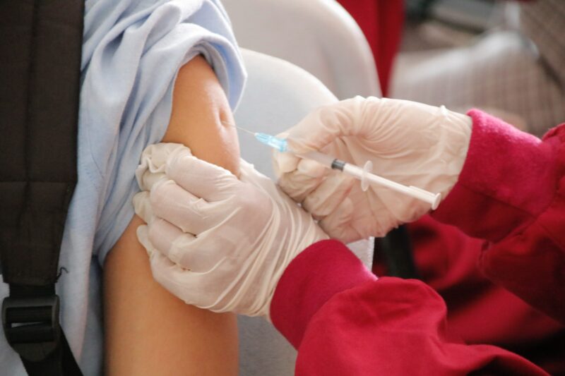 Young person receiving their vaccination