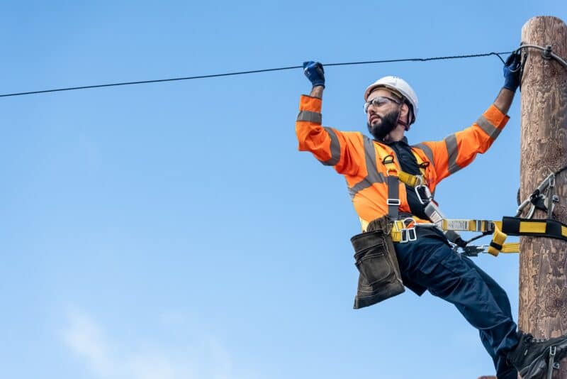 Openreach engineer installing fibre cables