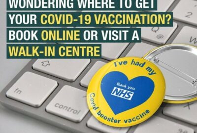 An advert encouraging people to book their vaccination online or to go to a walk-in vaccination centre.