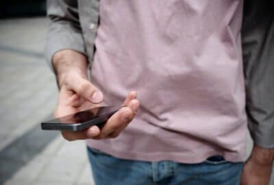 Man looking at his phone screen