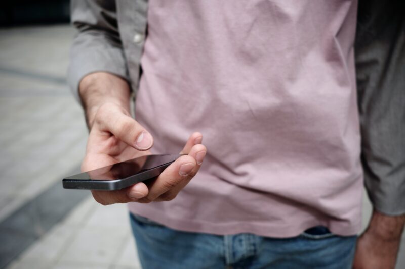 Man looking at his phone screen