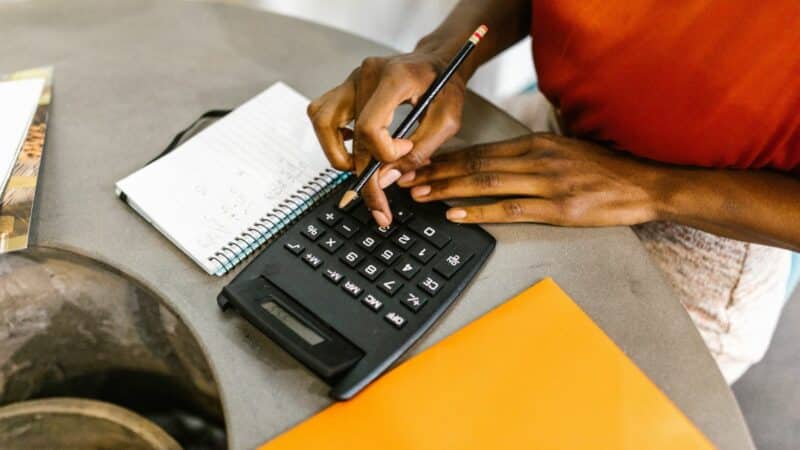 Woman using a calculator