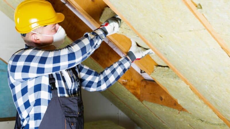 Loft insulation being installed