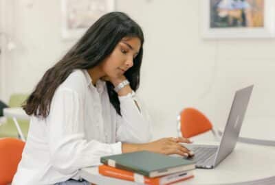A woman working on a laptop