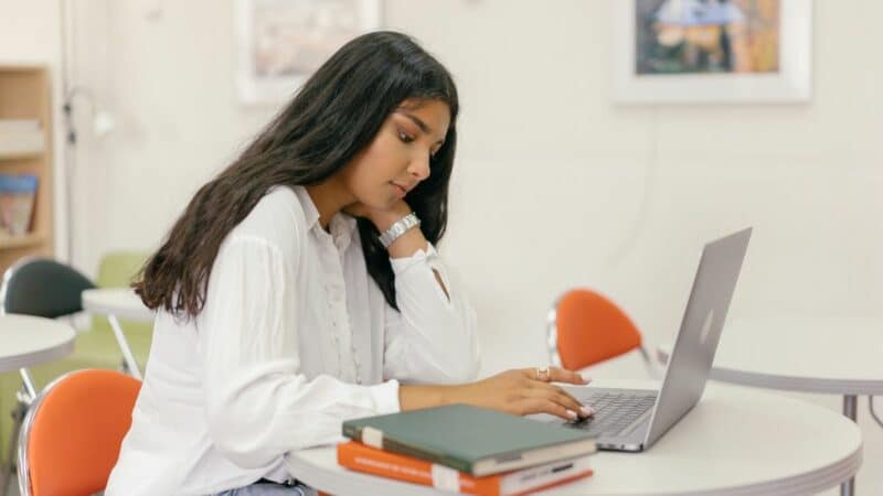 A woman working on a laptop