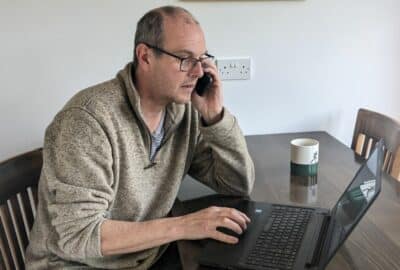 Business owner on his mobile phone