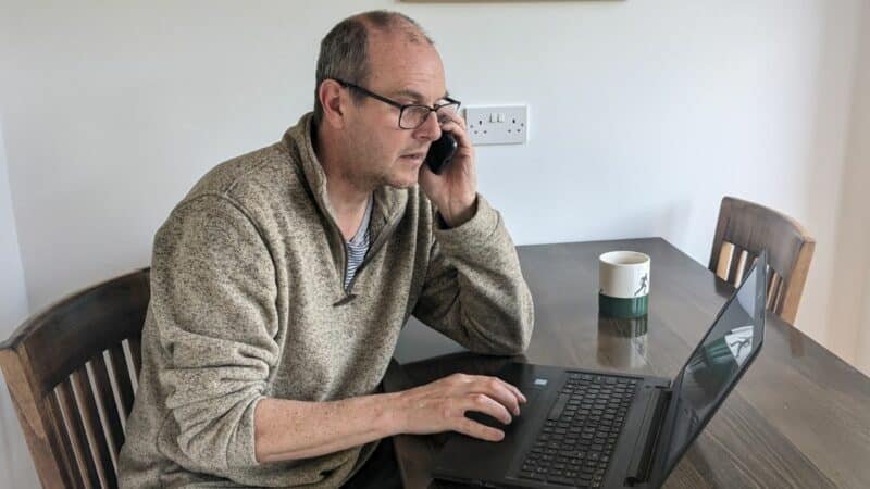 Business owner on his mobile phone