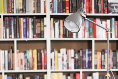 library books and a lamp