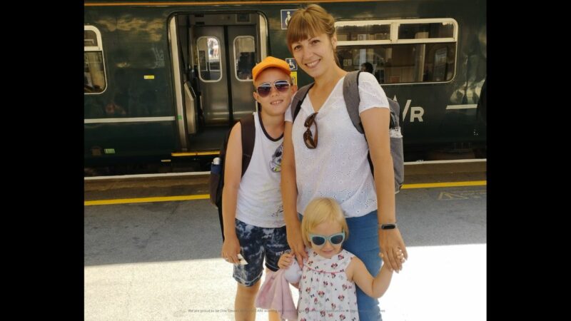 Oksana and her children a railway station