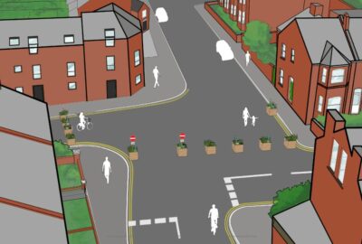 An illustration of a junction with planters forming a bus gate.