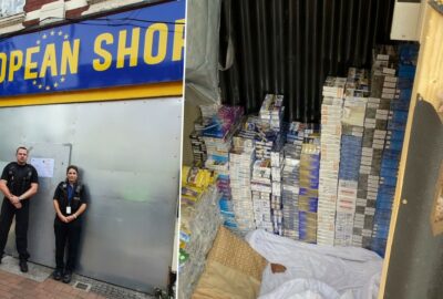 Police officers standing outside shop and pile of illegal tobacco