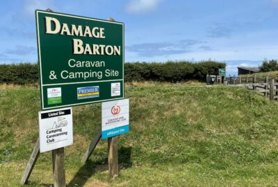 Sign at Damage Barton Caravan and camping Site