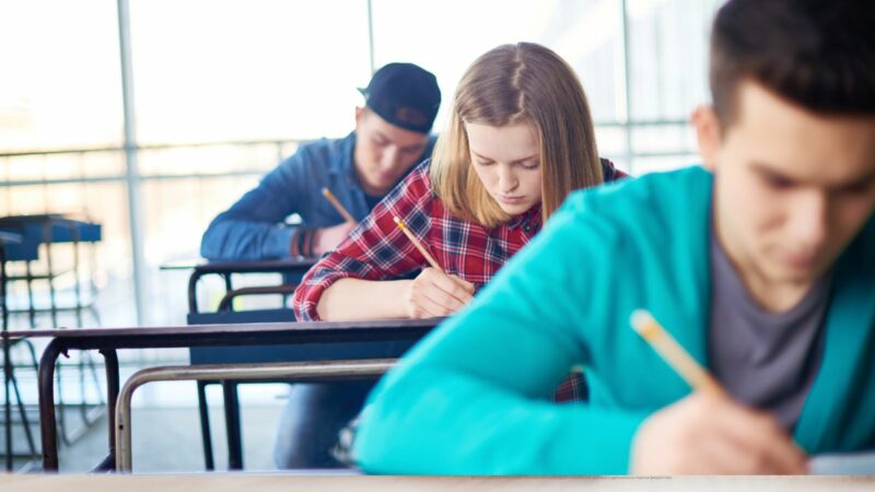 young people sitting their exams