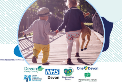 Two children holding hands as they walk over a bridge in sunlight. There are also the logos of the partners in the Devon SEND offer.