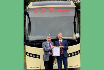 Clifford Down receives a certificate of appreciation from Damien Jones of Devon County Council