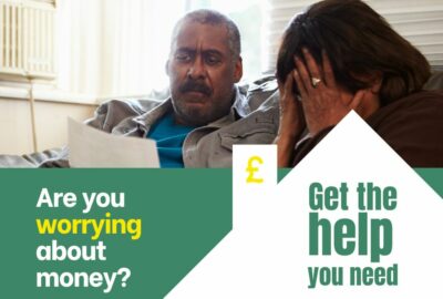 Are you worrying about money? Get the help you need. Couple with bill looking worried.