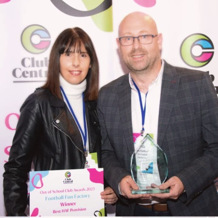 Jon and Becky Radford with their award