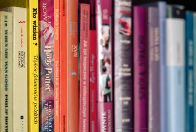 a row of book on a book shelf