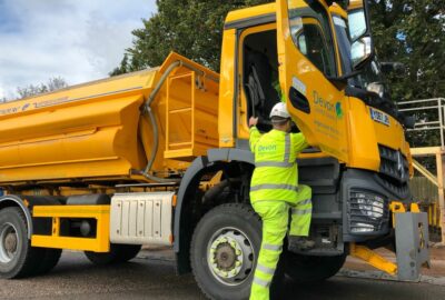 Gritter driver getting into a gritting lorry