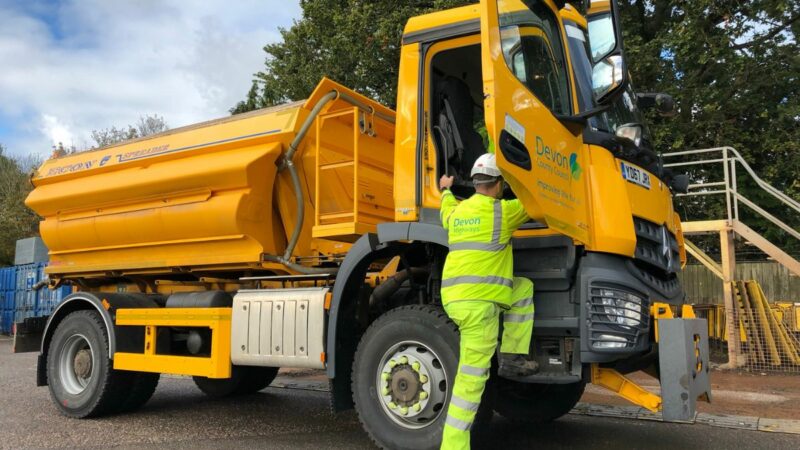 Gritter driver getting into a gritting lorry