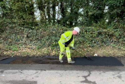 Devon Highways team patching a road