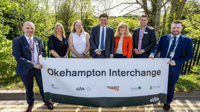 Left to right: Ian Mundy (GWR Senior Portfolio Manager), Councillor Lois Samuel (Devon County Councillor for Okehampton), Councillor Mandy Ewings (Leader of West Devon Borough Council), Mel Stride MP, Councillor Andrea Davis, (Devon County Council Cabinet Member for Climate Change, Environment and Transport), Bogdan Lupu (Network Rail industry programme director), and David Whiteway (GWR Regional Growth Manager).