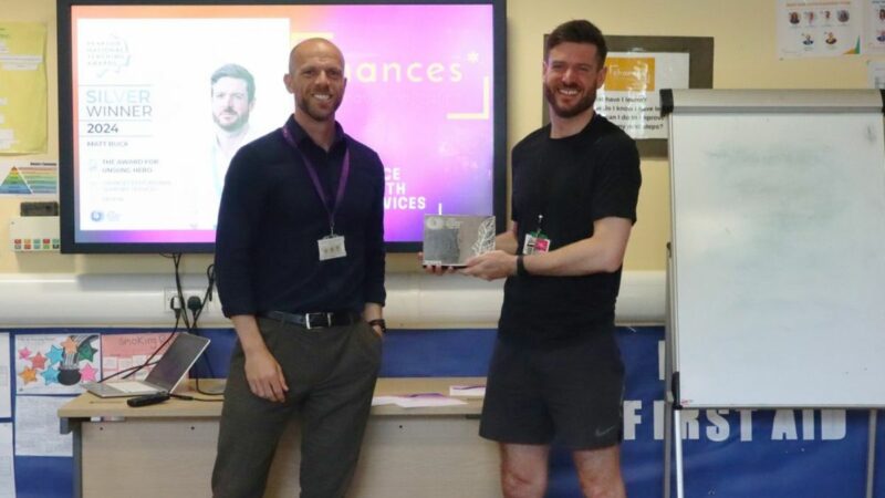 Matt Buck in the classroom with the Head Teacher at Chances