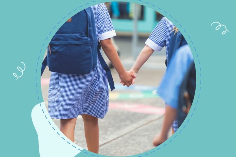 School children holding hands