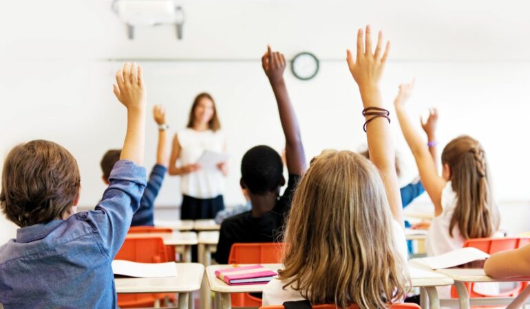 Primary school age children in their classroom