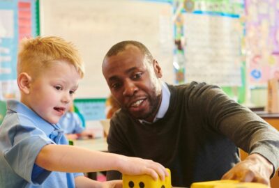 Teacher with young boy