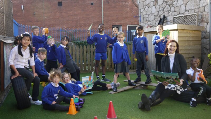 School children in the school garden with Anne Billington