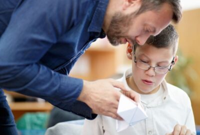 Adult working with child