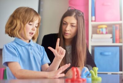 Teacher working 1:1 with child