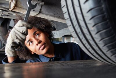 An apprentice learning their trade in a workshop