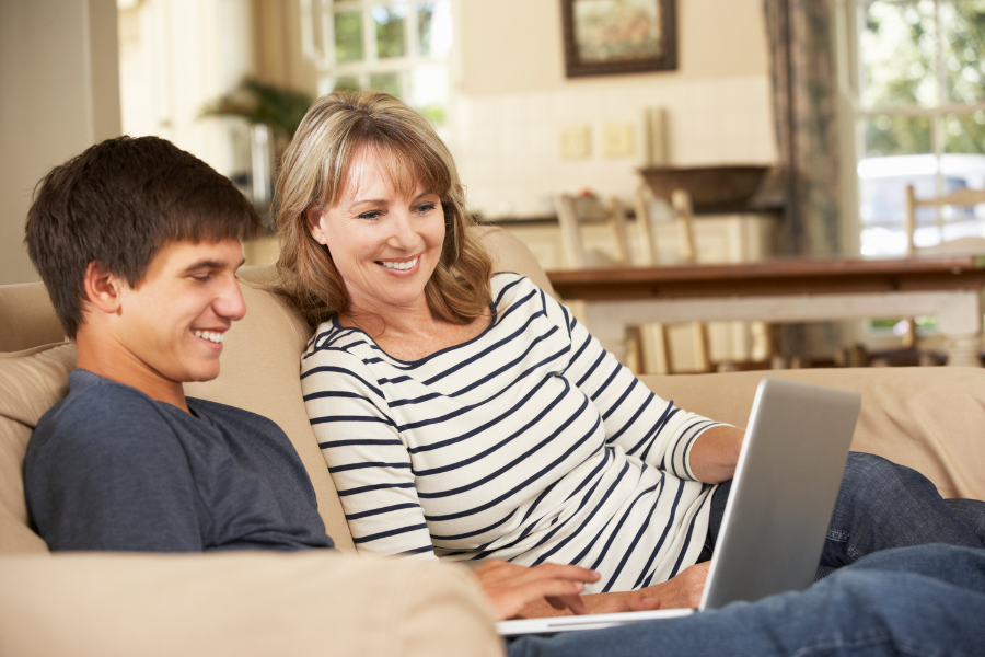 Mother and son on laptop