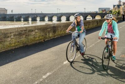 Two people cycling in Barnstaple