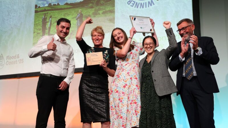 Members of the DRIP team collecting their Flood & Coast Excellence Award