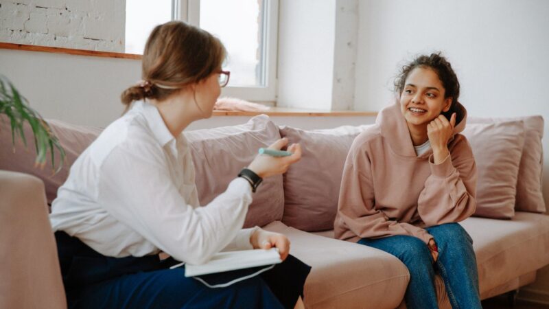 Adult talking to young person