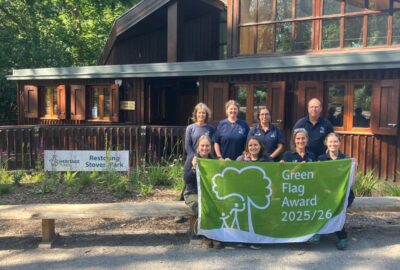 The team at Stover Country Park celebrates with this year's Green Flag