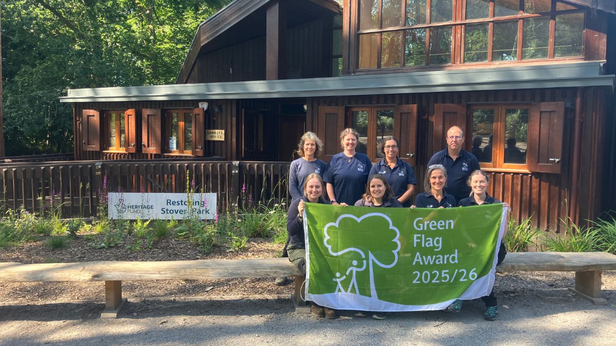 The team at Stover Country Park celebrates with this year's Green Flag