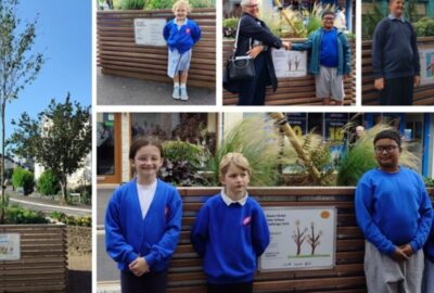 Some of the young artists with their tree planter plaques