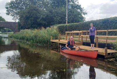 Canal Ranger Craig Saunderson and Minnows Touring Park Owner Julie Evans at the new landing stage beside Holbrook Bridge