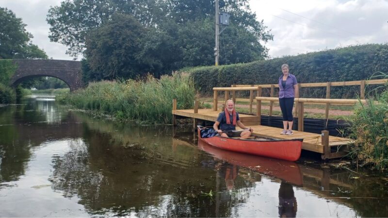 Canal Ranger Craig Saunderson and Minnows Touring Park Owner Julie Evans at the new landing stage beside Holbrook Bridge