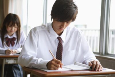 Teenager boy in class
