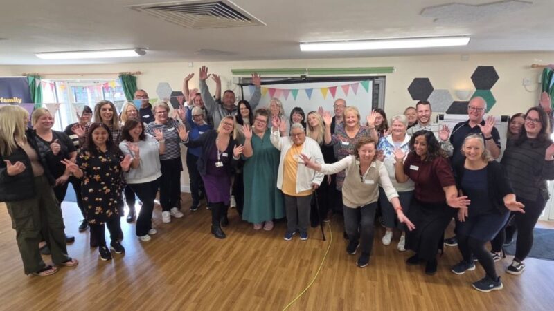 A group photo of Kinship Carers enjoying the celebration event